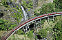 Kuranda Scenic Railway passing Stoney Creek Falls